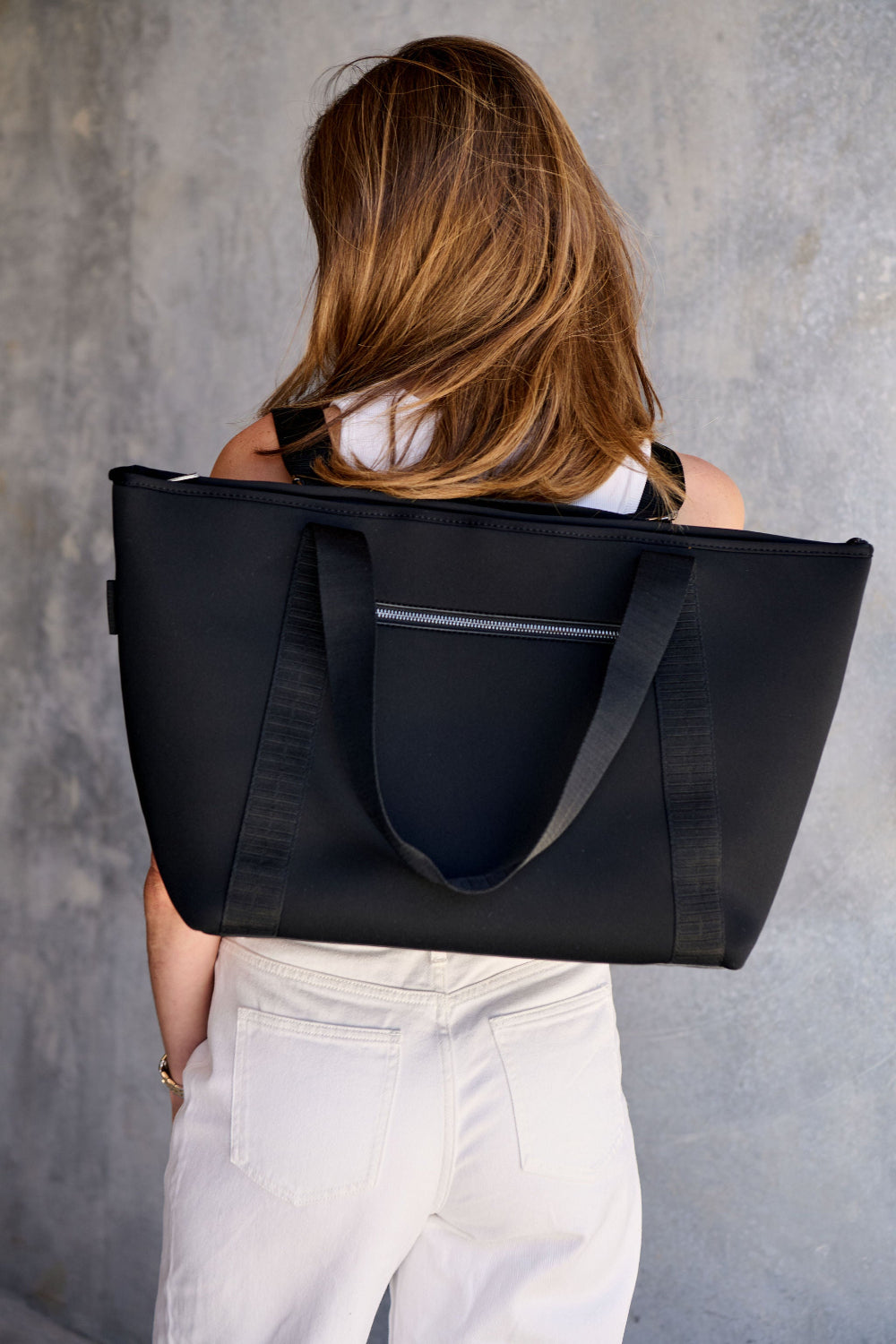 Black carry all womens convertible tote backpack bag in neoprene XL with adjustable straps