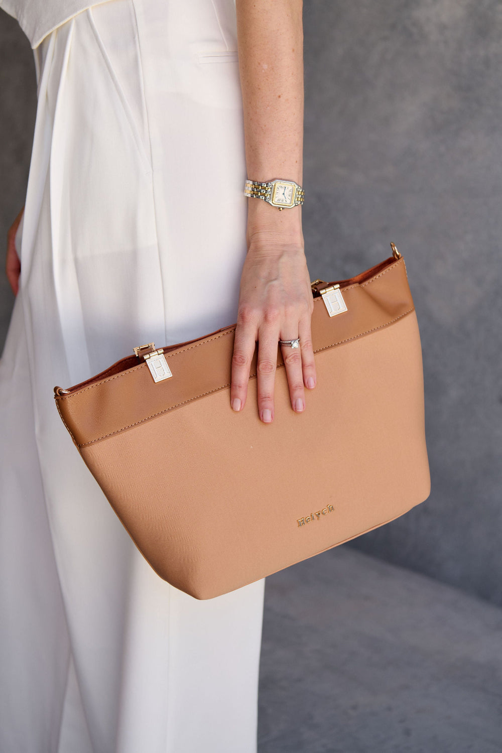 Tan convertible clutch bag