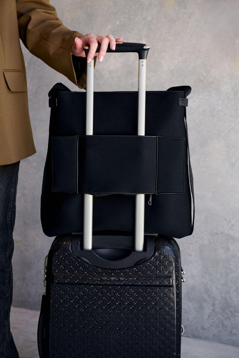 Black convertible tote backpack bag in neoprene with gunmetal hardware carry on travel bag