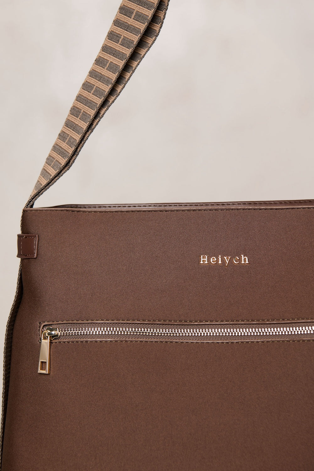 Chocolate brown bag with gold hardware