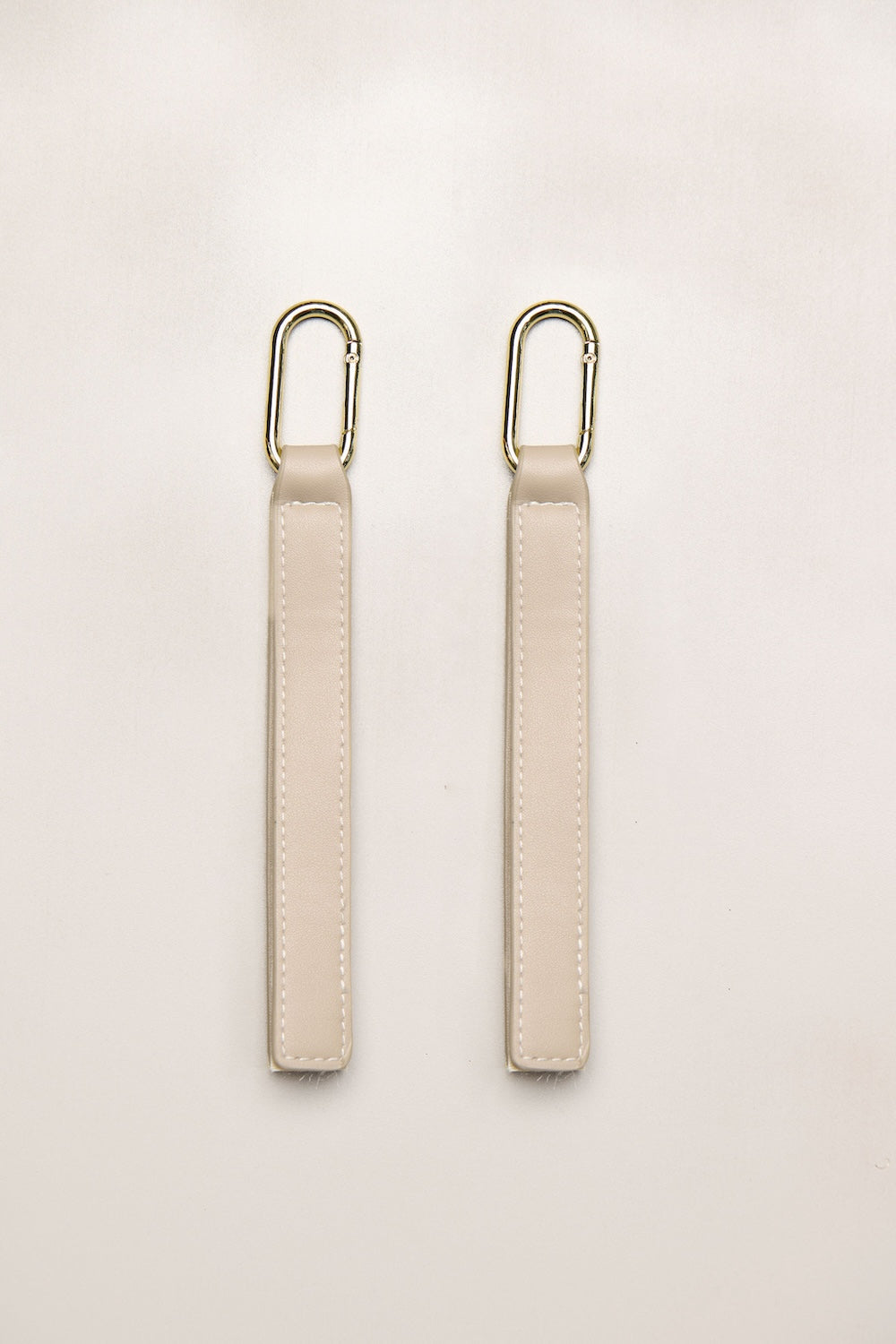 Taupe cream pram straps with gold hardware