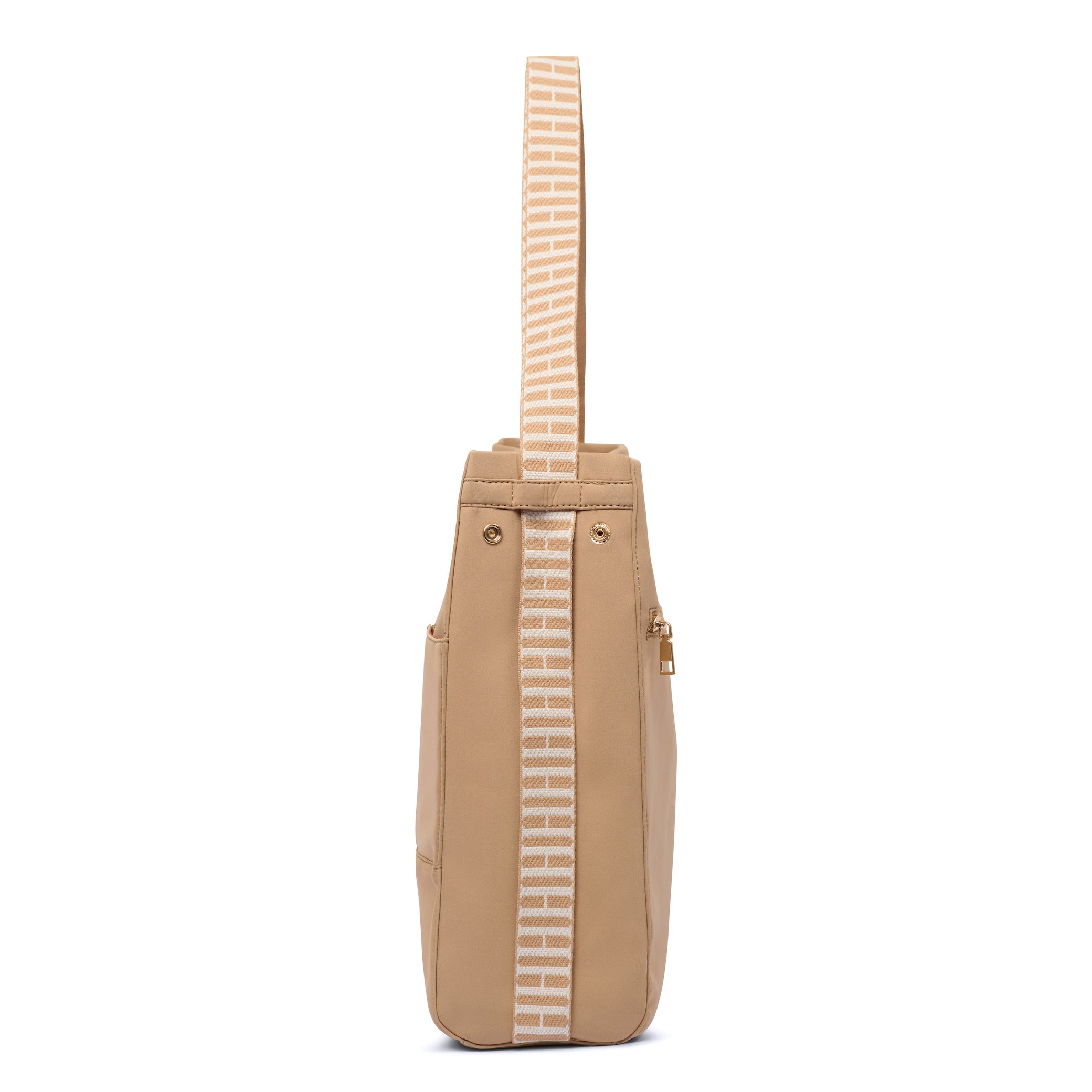 Side view of tote to backpack bag showing how it can convert as a 2-in-1 bag by pulling side cotton straps.
