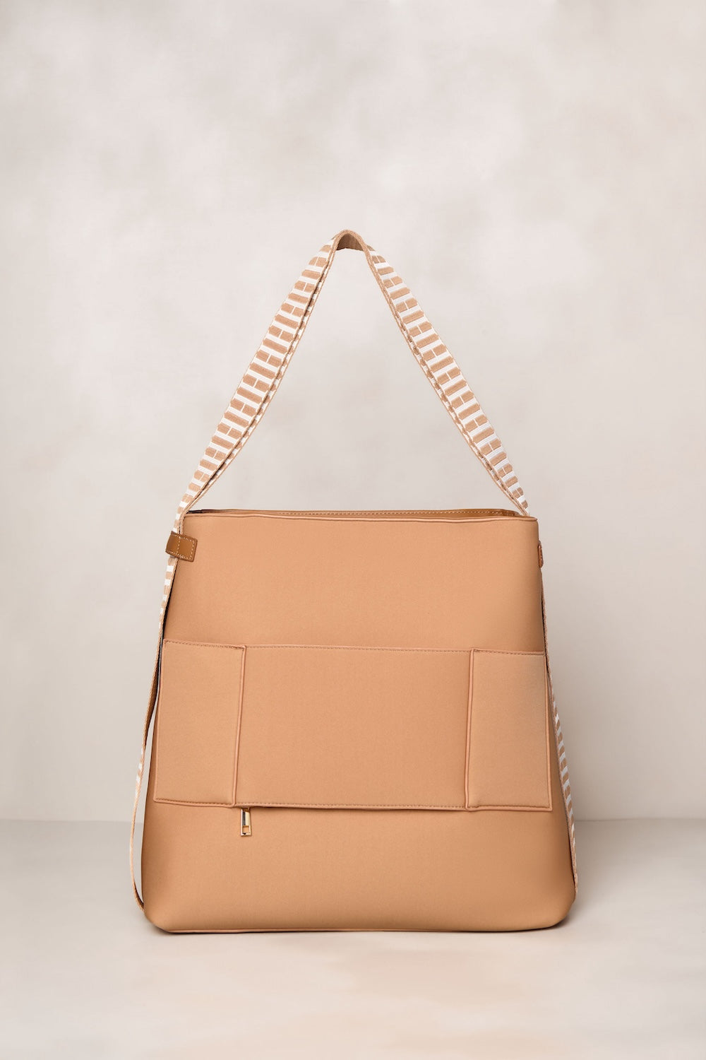 Tan convertible tote backpack bag in neoprene with gold hardware