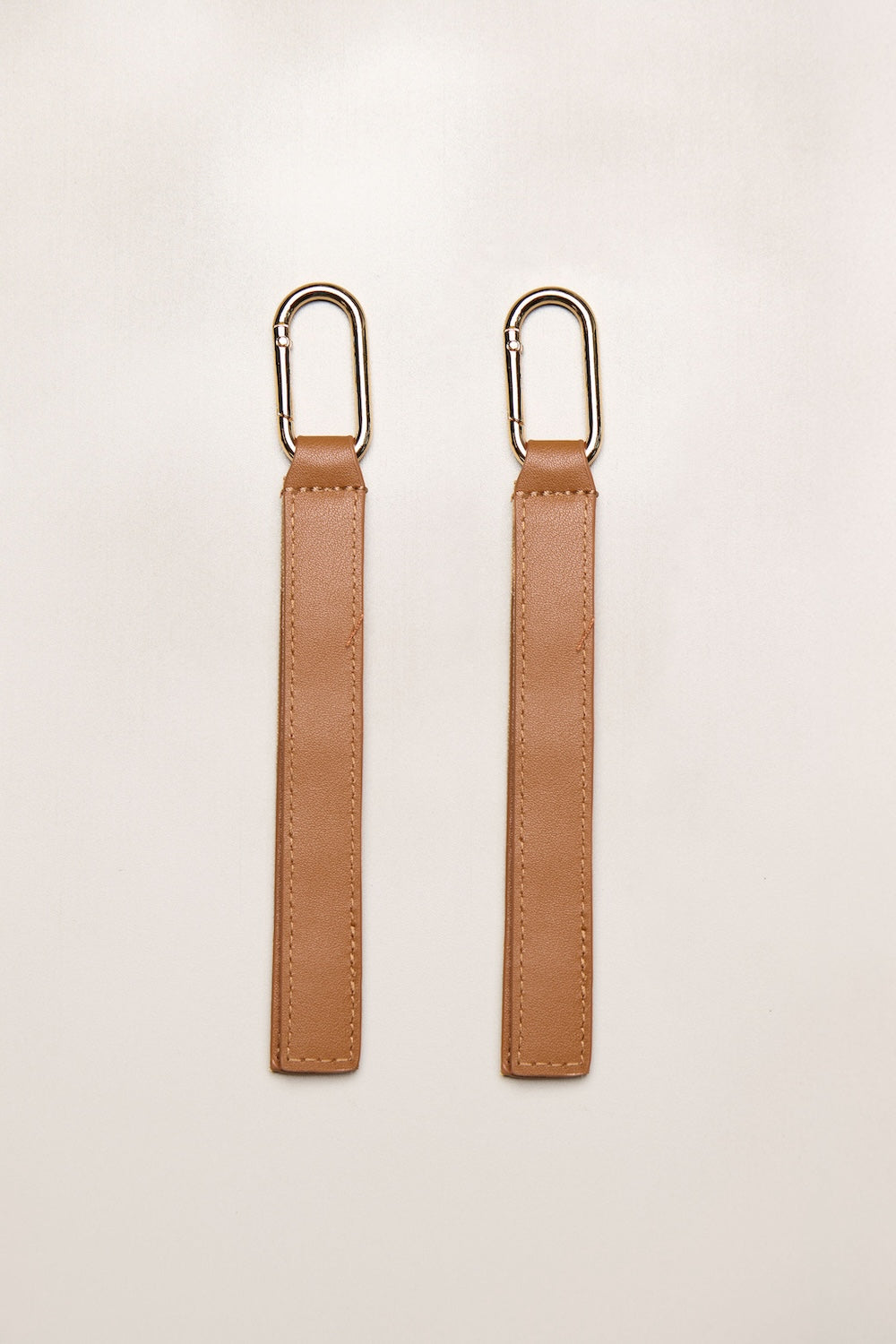 Tan leather pram straps with gold