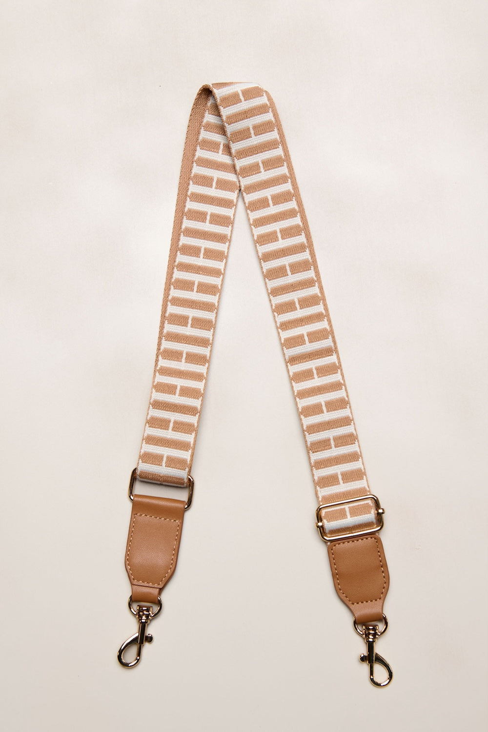 Tan adjustable crossbody strap