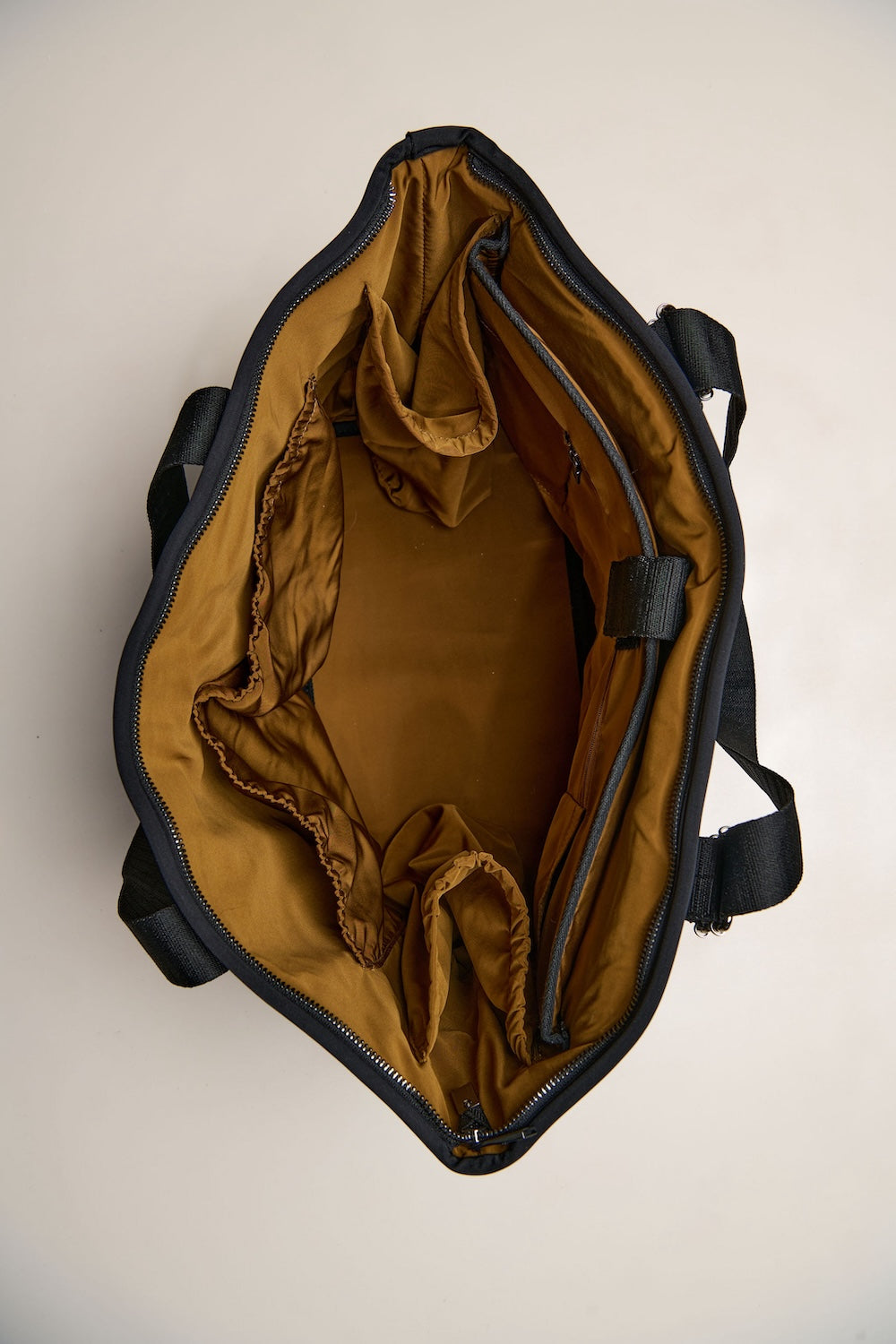 Black carry all womens convertible tote backpack bag in neoprene XL with adjustable straps inside pockets