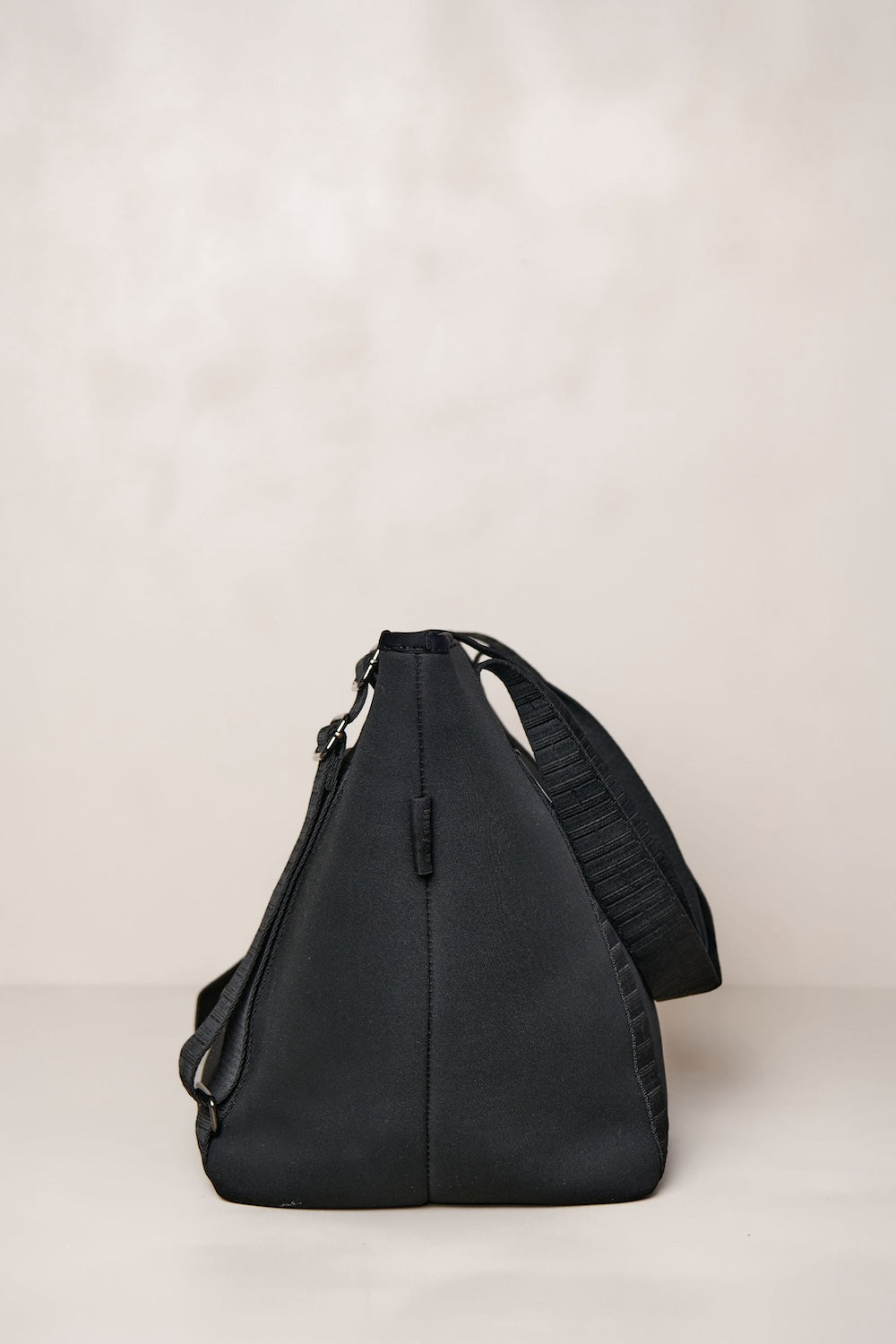 Black carry all womens convertible tote backpack bag in neoprene XL with adjustable straps side